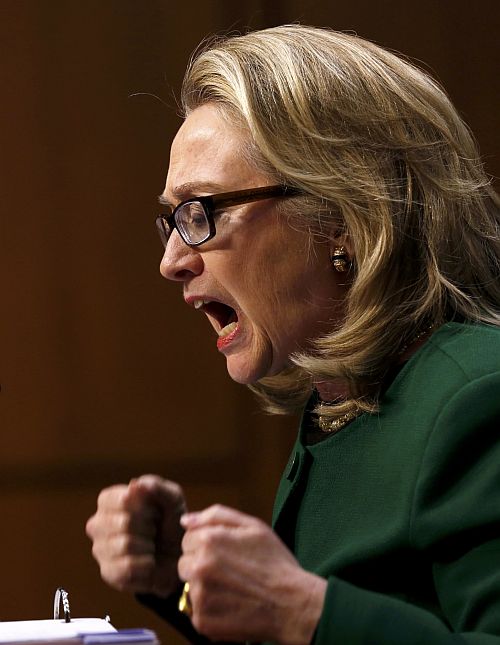 US Secretary of State Hillary Clinton pounds her fists as she responds to intense questioning on the September attacks on US diplomatic sites in Benghazi, Libya, during a Senate Foreign Relations Committee hearing on Capitol Hill in Washington