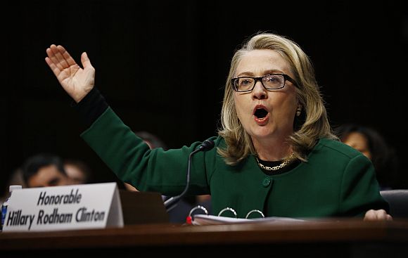 Clinton pounds on her table while testifying