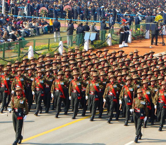 Assam Rifles marching contingent passes through the Rajpath during the 64th Republic Day parade