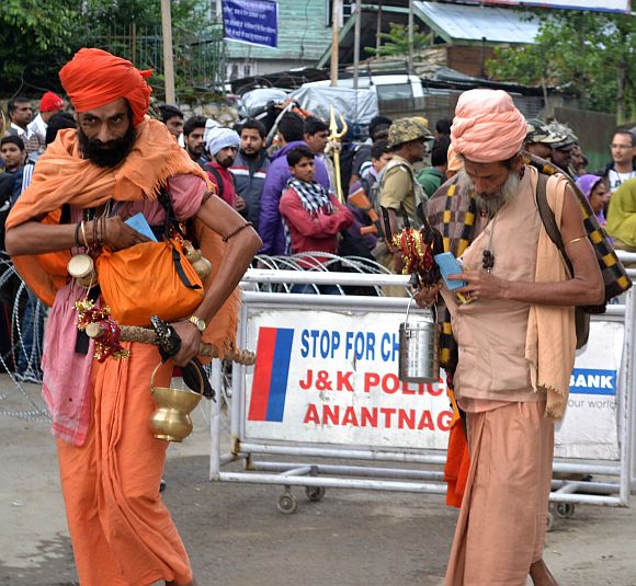 Two Sadhus begin their journey to the cave shrine