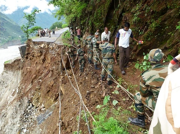 Two bridges being launched by the army for move of light vehicles in Uttarkashi