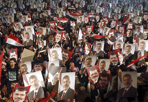 Tahrir Square throbs with prayers, protests