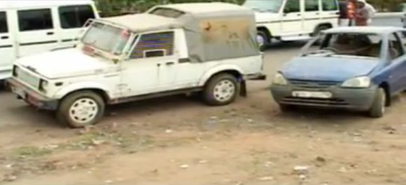 File photo of the police Gypsy and the Tata Indica in which Ishrat and others were travelling