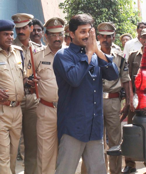 YSR Congress president Jaganmohan Reddy steps out of jail to appear in a CBI court amid tight security in Hyderabad