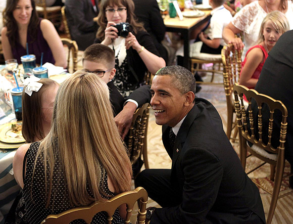 bama greets guests at the second annual 'kids' state dinner