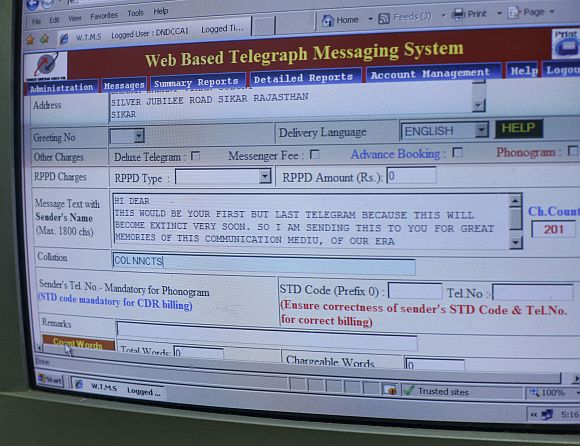 A computer screen shows a telegram message inside the central Telegraph office in New Delhi