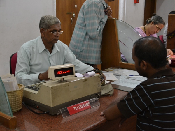 A customer gets his telegram booked at Mumbai's CTO on the day the 163-year-old service draws to a close