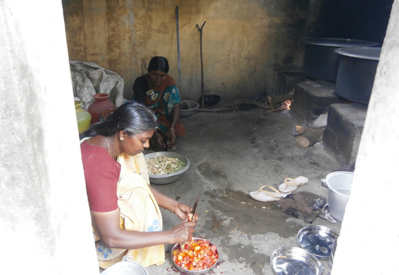 Activity under way in the kitchen at the Sri Ganesar Higher Secondary School in Panickanadarkudieruppu