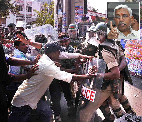 Osamania University students clash with the police during an agitation for Telangana in Hyderabad (Inset) Prof Kodandaram
