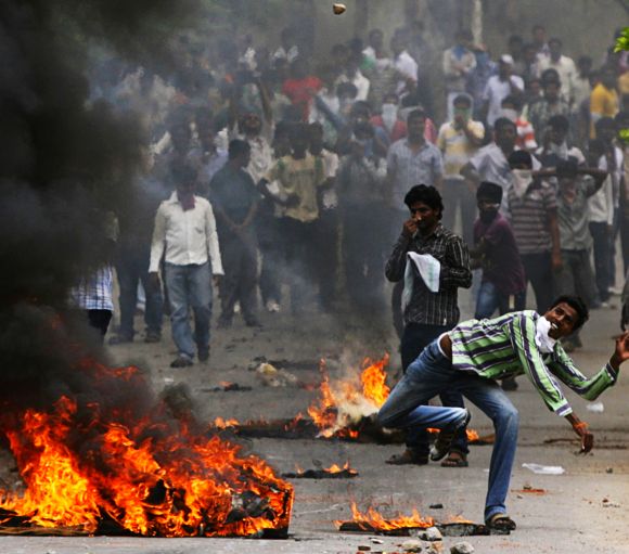 Pro-Telangana students clash with police personnel during an agitation in Hyderabad