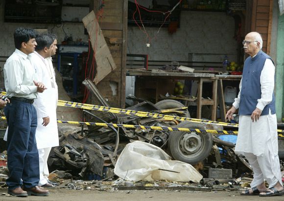 Former Home Minister L K Advani inspecting the site of a bomb blast in Mumbai in 2003