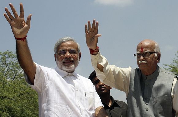 Advani with Gujarat Chief Minister Narendra Modi during a campaign rally in Gandhinagar.
