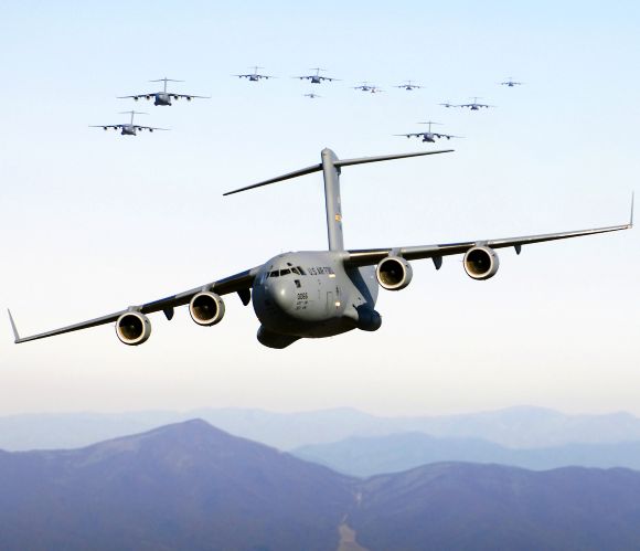 Thirteen C-17 Globemaster III aircraft fly over the Blue Ridge Mountains in Virginia, US during low level tactical training