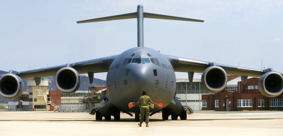 A Boeing C-17 Globemaster III aircraft arrives at the Fairbairn Air Force Base near Canberra, Australia
