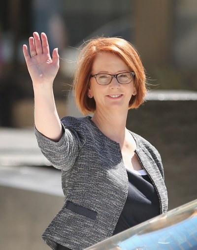 Gillard waves as she leaves Melbourne