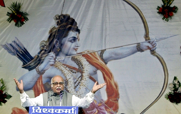 Advani gestures during a public meeting in Bhopal
