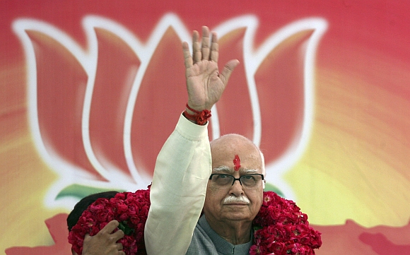 Advani waves to his supporters before filing his nomination in Gandhinagar, in this photograph taken on April 8, 2009