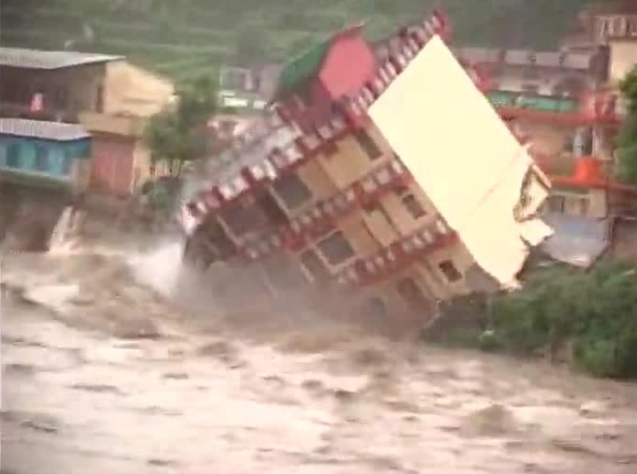 A building collapses due to heavy rains in Uttarakhand