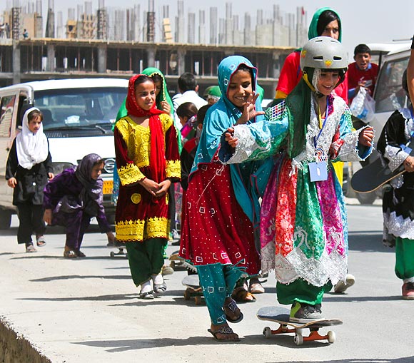 Students practice skating on the streets of Kabul