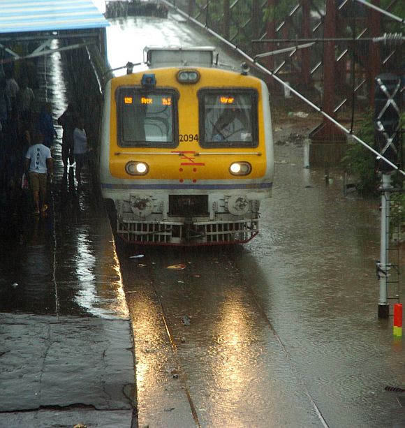 A Virar-bound local train at a flooded station