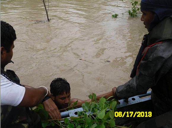 Army personnel conducting flood-relief operation in Uttarakhand
