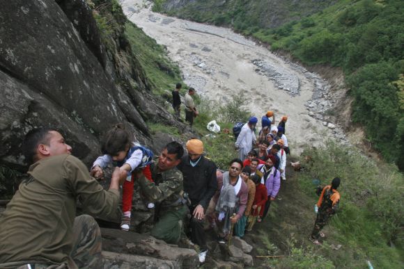 Soldiers rescue stranded people in rain-ravaged Uttarakhand