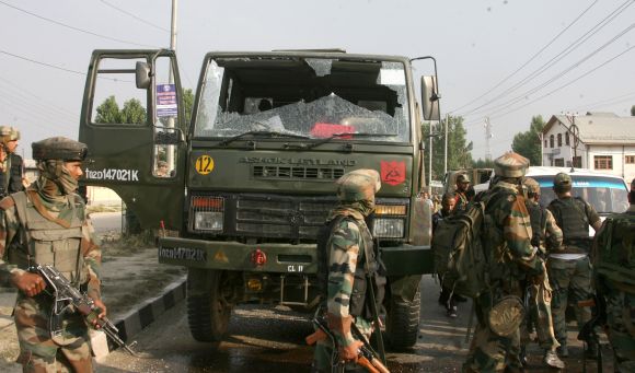 The broken windshield of the army truck that was attacked in amilitant strike outside Srinagar on Monday