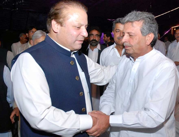 Federal minister Rana Tanveer Hussain (right) paid no taxes last year