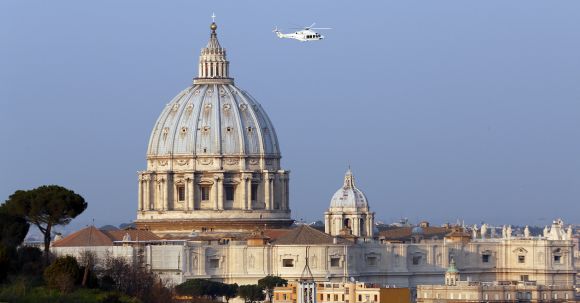 A helicopter carrying Pope Benedict XVI takes off from inside the Vatican on its way to the papal summer residence at Castelgandolfo