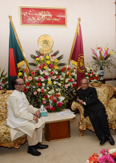 President Pranab Muukherjee speaks to his Bangladeshi counterpart Zillur Rahman during a meeting in Dhaka