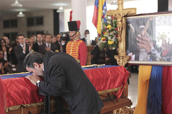 Mahmoud Ahmadinejad pays tribute to Hugo Chavez