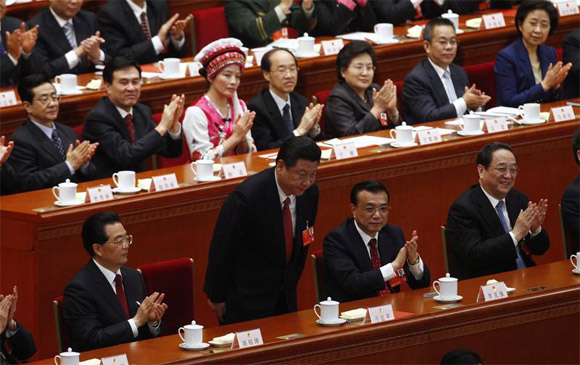 Jinping bows during the fourth plenary meeting of the National People's Congress