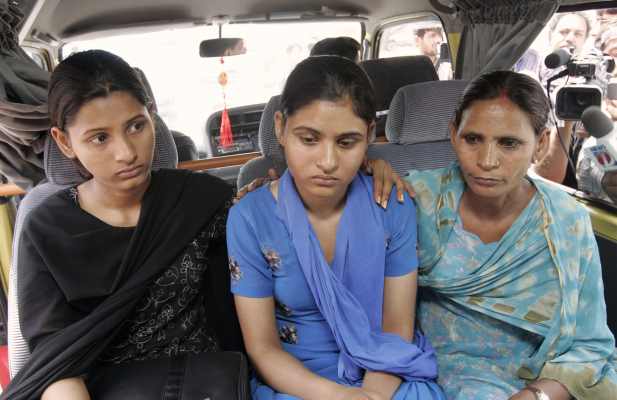 Sukhpreet Kaur, wife of Sarabjit Singh along with her daughters Swapandip and Poonam