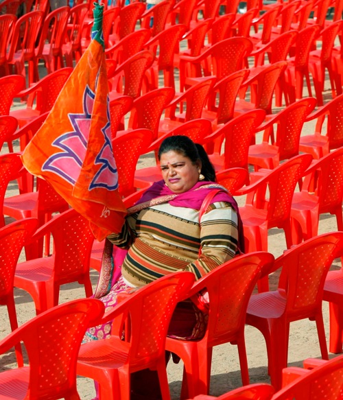 A supporter of the Bharatiya Janata Party waits for a public rally 2010A supporter of the Bharatiya Janata Party waits for a public rally