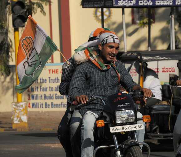 Congress supporters celebrate in Bengaluru on Wednesday