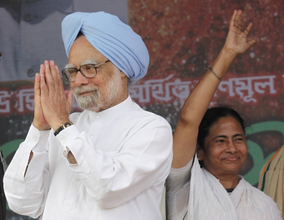 Trinamool Congress Chief Mamata Banerjee along with Prime Minister Manmohan Singh before she walked out of the coalition