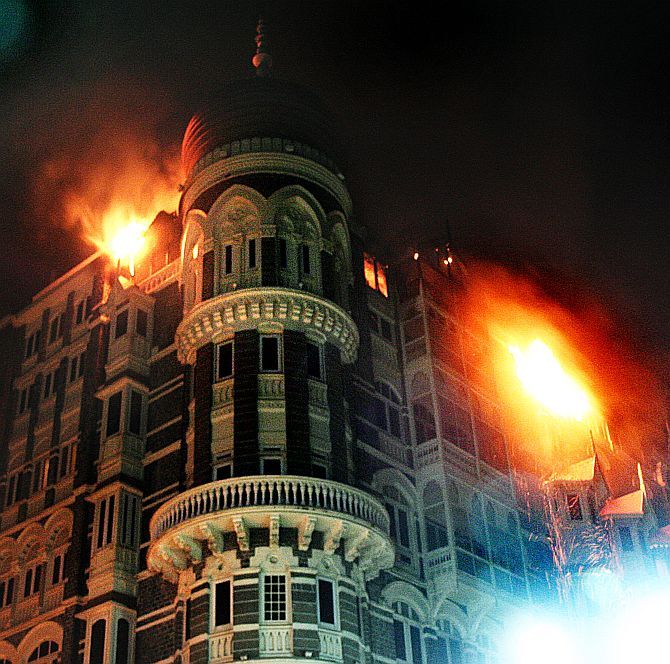 Flames arise from the Taj Mahal hotel, early on November 27, 2008, after the terrorists attacked the iconic Mumbai hotel. Photograph: Uttam Ghosh/Rediff.com