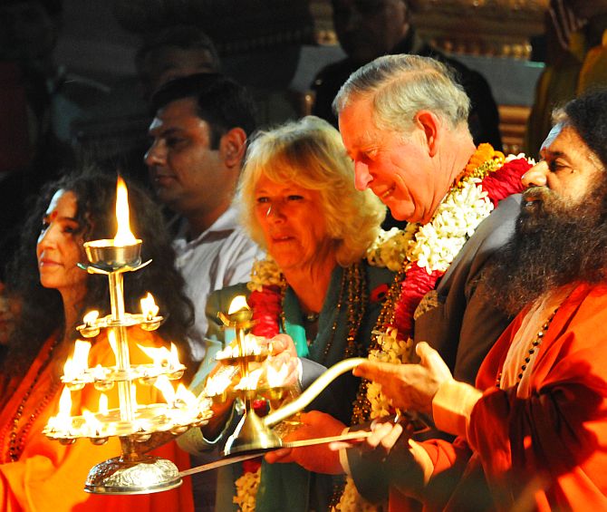 Prince Charles and his wife Camilla Parker Bowles attend Ganga arti in Rishikesh on Wednesday