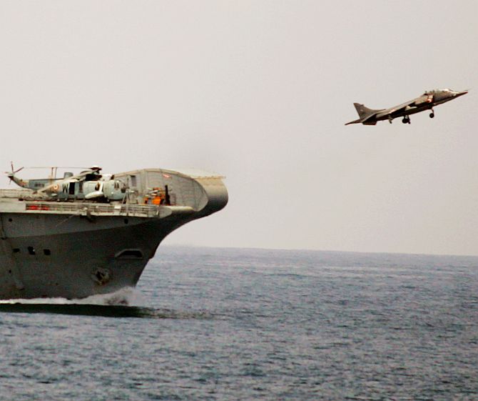 A fighter Sea Harrier takes off from INS Virat near the coast of Goa 