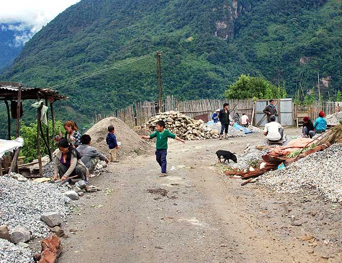 Residents of Menchuka, the largest village before the McMahon Line, which separates India and China.