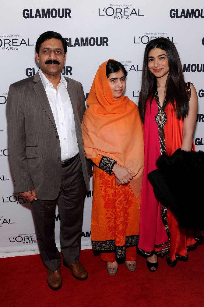 Malala with her father Ziauddin Yousafzai arrive for the award function in New York