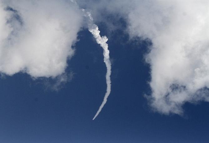 Polar Satellite Launch Vehicle, carrying the Mars orbiter, blasts off from the Satish Dhawan Space Centre in Sriharikota