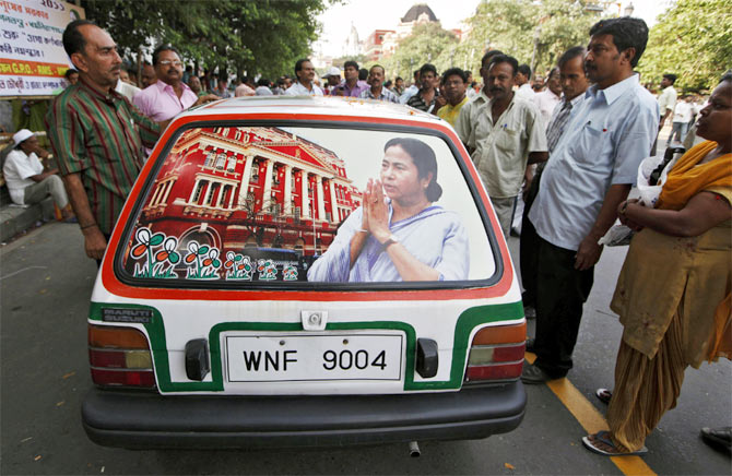 A car decorated with an image of Mamata Banerjee after she took the oath as chief minister.