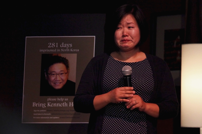 Terri Chung, sister of Kenneth Bae, cries during a speech at a vigil for Kenneth Bae in Seattle, Washington