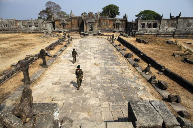 Cambodian soldiers walk at the 11th-century Preah Vihear temple on the border between Thailand and Cambodia.