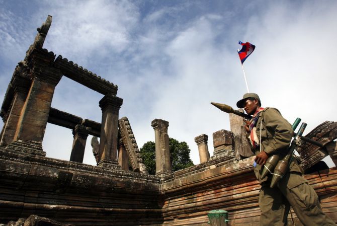 A Cambodian soldier patrols at Preah Vihaer temple