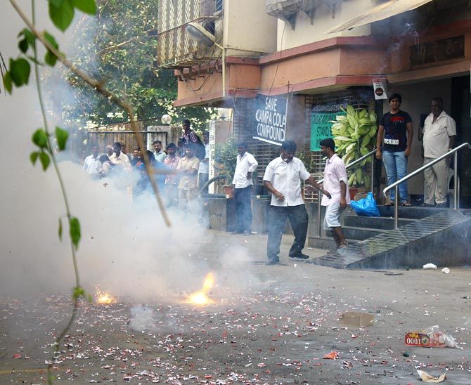 Residents burning crackers to celebrate the SC order