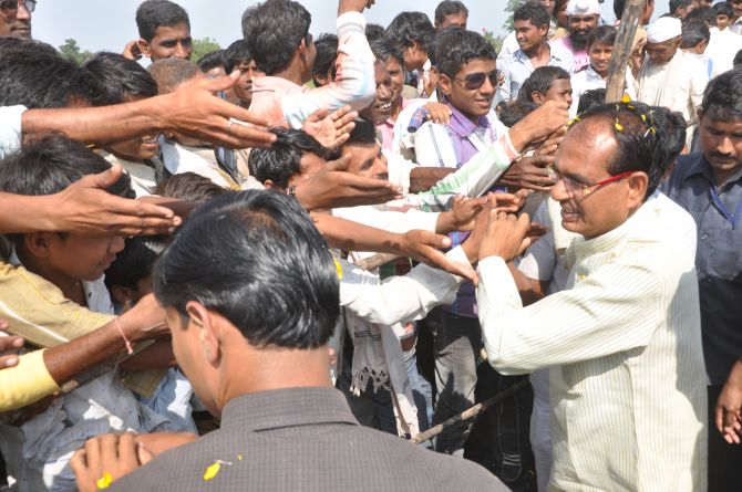 Shivraj Singh Chouhan greets supporters during a function at Nepanagar