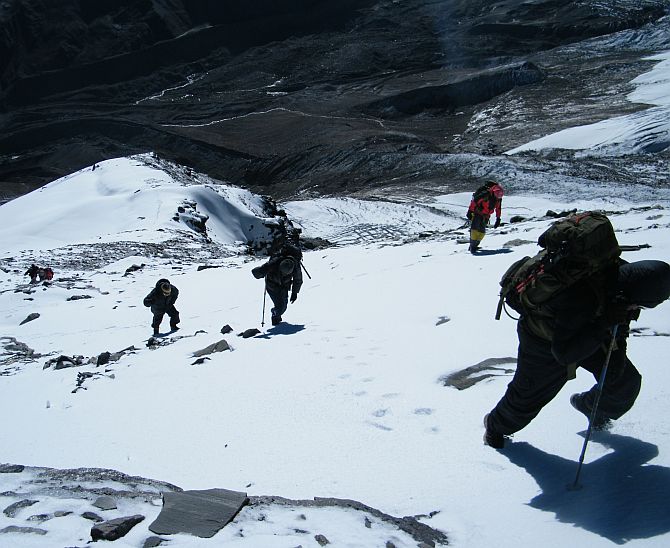 The team on the way to the top of Mt Rudugaira