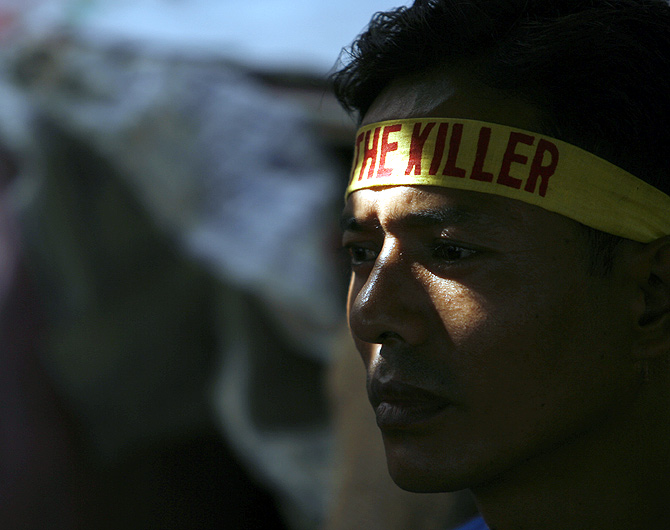 A Tibetan exile watches during a hunger strike against the Chinese government in Delhi